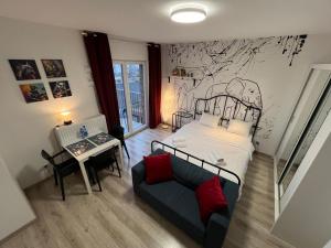 Posteľ alebo postele v izbe v ubytovaní Wileńska Express Apartment