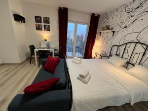 Posteľ alebo postele v izbe v ubytovaní Wileńska Express Apartment