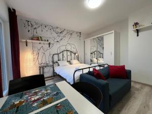 Posteľ alebo postele v izbe v ubytovaní Wileńska Express Apartment