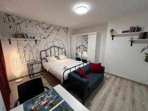 Posteľ alebo postele v izbe v ubytovaní Wileńska Express Apartment