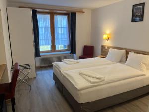 Postel nebo postele na pokoji v ubytování Hotel Drei Könige