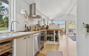 Η κουζίνα ή μικρή κουζίνα στο Holiday Home Venusvej