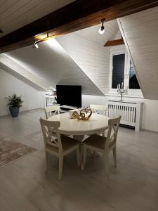 TV a/nebo společenská místnost v ubytování Casa Styner