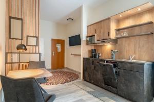Kuchyň nebo kuchyňský kout v ubytování Hotel Esplanade Dortmund