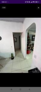 a living room with a christmas tree in a room at Casa in Brasilia