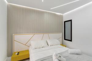 Postel nebo postele na pokoji v ubytování Apt Ruvi