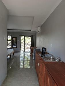 Kuchyň nebo kuchyňský kout v ubytování NAMU Apartments