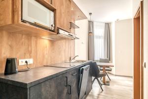 Kuchyň nebo kuchyňský kout v ubytování Hotel Esplanade Dortmund