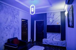 TV o dispositivi per l'intrattenimento presso Skyrock Hotels Ikeja