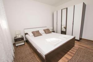 Postel nebo postele na pokoji v ubytování Apartment Grdelin