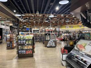 a grocery store aisle with a groceryploadploadploadploadploadploadploadploadpload at Islander on the Beach 351 in Kapaa
