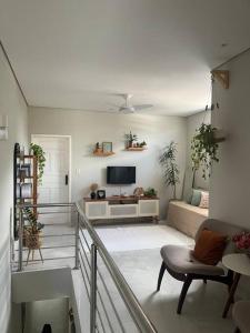 TV a/nebo společenská místnost v ubytování Casa no Centro-Ótima localização