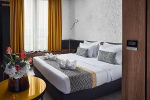 Katil atau katil-katil dalam bilik di Hotel Panoramika Design & Spa