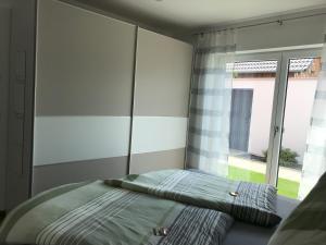 Postel nebo postele na pokoji v ubytování Appartementhaus Angelika