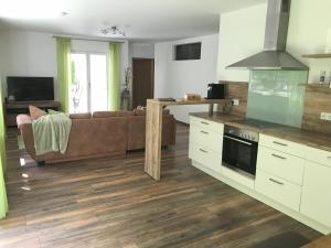 Kuchyň nebo kuchyňský kout v ubytování Appartementhaus Angelika