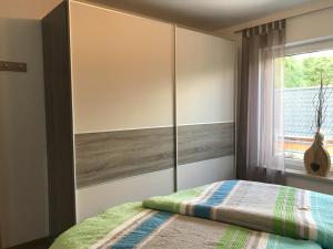 Postel nebo postele na pokoji v ubytování Appartementhaus Angelika