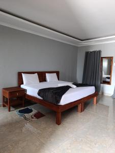 Postel nebo postele na pokoji v ubytování NAMU Apartments