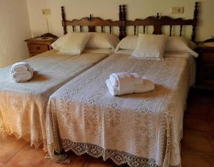 Ένα ή περισσότερα κρεβάτια σε δωμάτιο στο Apartamento Rural Jana