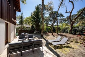 Κήπος έξω από το Villa Camélia à deux pas de la plage PYLA SUR MER