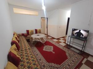 TV a/nebo společenská místnost v ubytování Appartement d'été