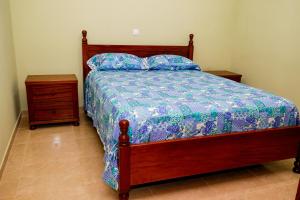 Ένα ή περισσότερα κρεβάτια σε δωμάτιο στο FADIAS Quartos - Rooms +12 φωτογραφίες