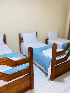 Postel nebo postele na pokoji v ubytování Pousada da Orla