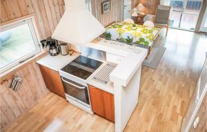 Kuchyň nebo kuchyňský kout v ubytování Holiday Home Indemarken Hjørring Iv + 8 fotografií