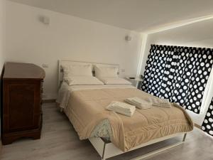 Ένα ή περισσότερα κρεβάτια σε δωμάτιο στο Sotto le Stelle +23 φωτογραφίες