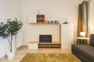 Un televizor și/sau centru de divertisment la PrimoPiano - Volvinio