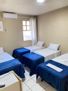 Postel nebo postele na pokoji v ubytování Pousada da Orla