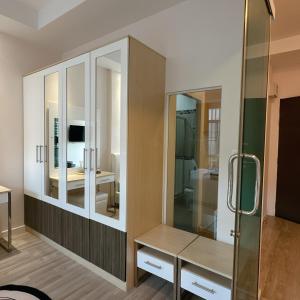 a bathroom with a sink and a mirror at Stylish room Near Central Fest in Chiang Mai +70 photos