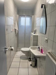 Koupelna v ubytování Hotel Hildesheimer Hof