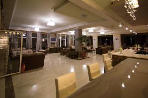 A restaurant or other place to eat at Aphrodite Hotel