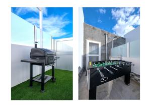 een barbecue en een barbecue bij Villa Cassia - Private Pool, Foosball, BBQ, Air-Con and SAT Tv By Lanzarote Vacation Homes in Playa Blanca