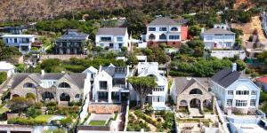 arial view of a city with houses at The Dragon Tree Guesthouse in Kalk Bay