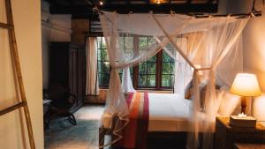 Katil atau katil-katil dalam bilik di Dunes Unawatuna Hotel