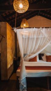 Katil atau katil-katil dalam bilik di Dunes Unawatuna Hotel
