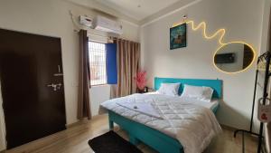 Postel nebo postele na pokoji v ubytování Kasha Homestay