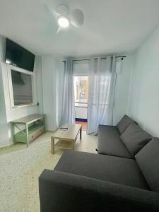 Χώρος καθιστικού στο APARTAMENTO PORTIL PLAYA