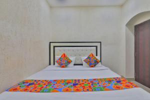 Letto o letti in una camera di Millenium Residency