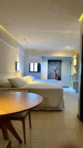 Postel nebo postele na pokoji v ubytování Loft 1 Edf celita Franca Business hotel