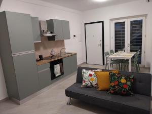 Η κουζίνα ή μικρή κουζίνα στο Residence La Vela 2