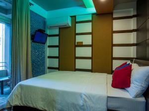 Postel nebo postele na pokoji v ubytování Ripple Beach Inn