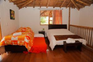 Postel nebo postele na pokoji v ubytování Hotel Campestre Inaoska Ecospa + 37 fotografií
