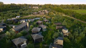 an aerial view of a house in a forest at Basecamp Amsterdam in Amsterdam
