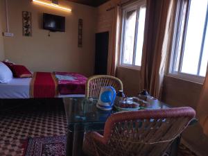 Łóżko lub łóżka w pokoju w obiekcie Hotel Desert