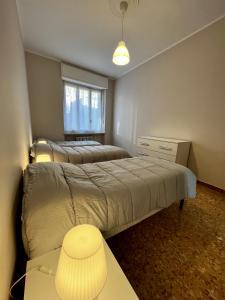 Postel nebo postele na pokoji v ubytování Porta Navina