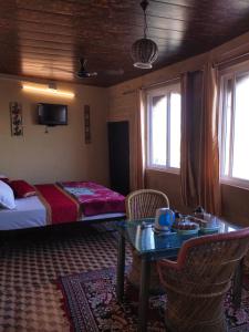 Łóżko lub łóżka w pokoju w obiekcie Hotel Desert