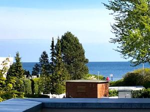 a view of the ocean from the roof of a house at Leuchtturm 7 in Grossenbrode +20 photos