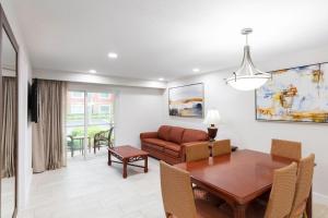 a living room with a table and a couch at Westgate Leisure Resort in Orlando